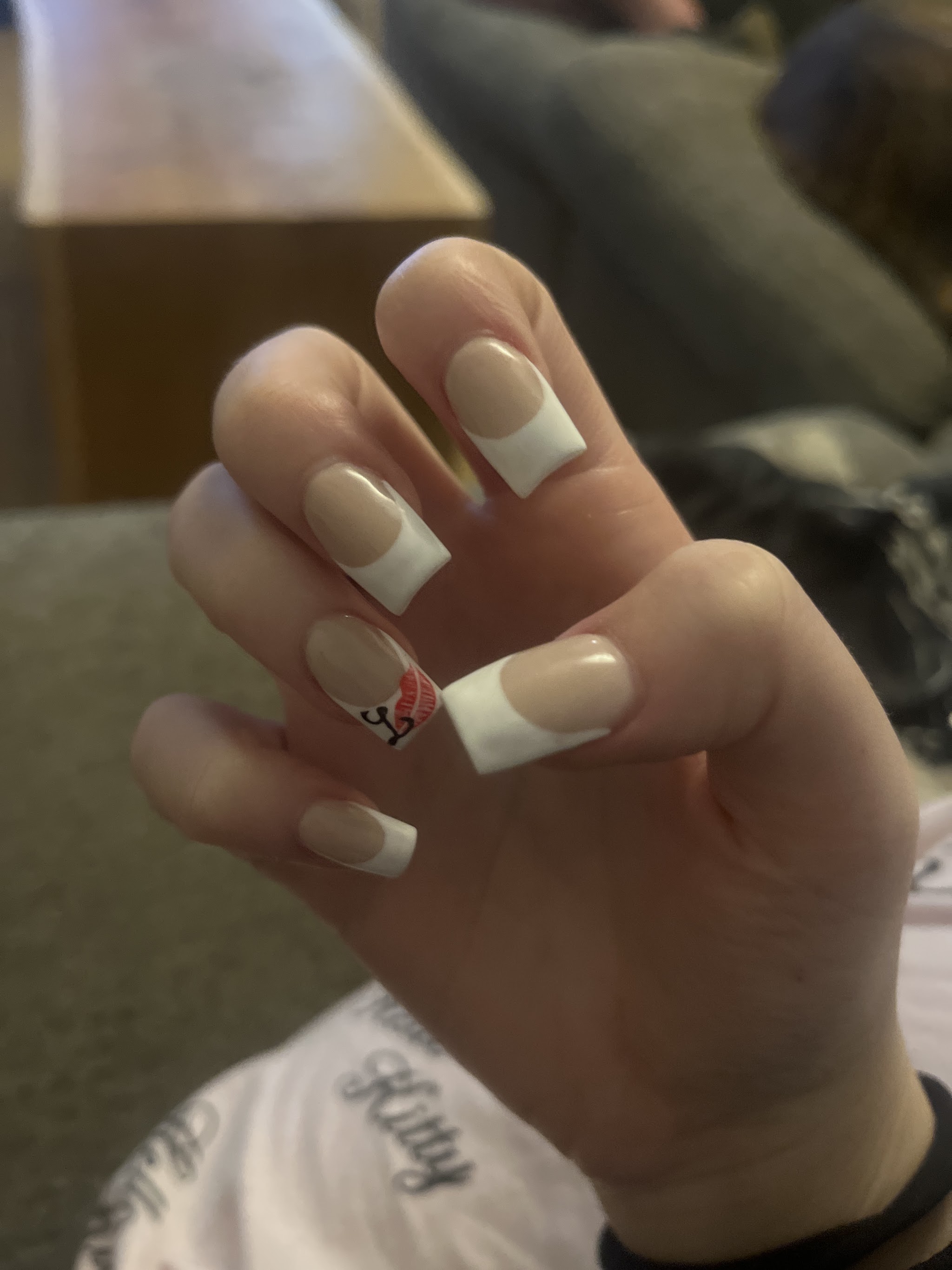 White French tips with a small heart accent
