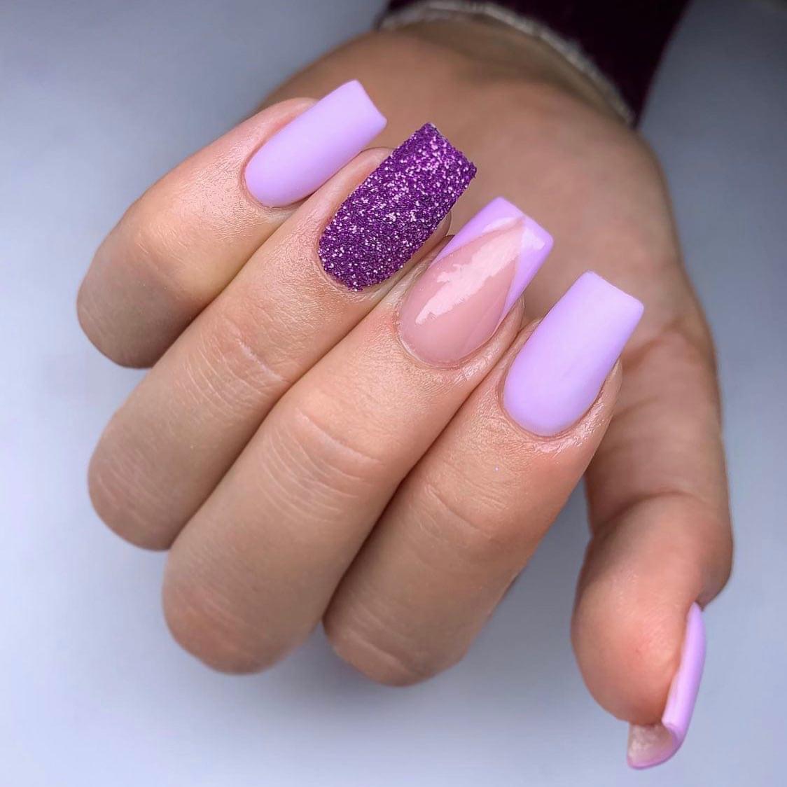Lilac nails with one purple glitter accent nail