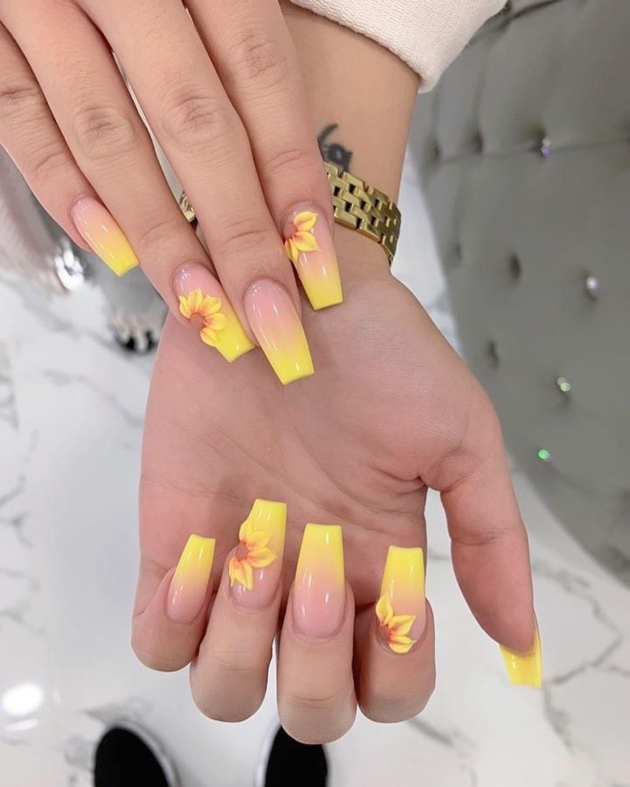 Yellow ombré nails with hand-painted sunflowers